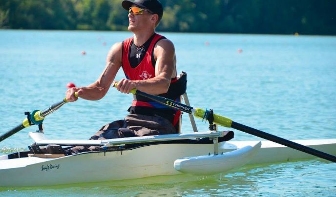 Adaptive Para rower with Swift wing rigger and floats