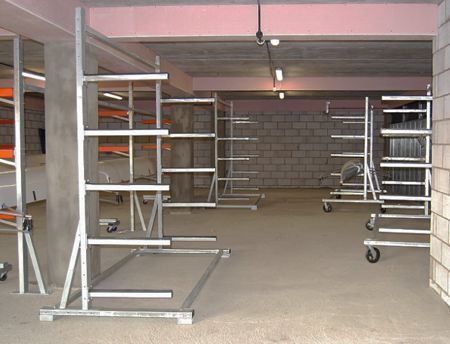 Indoor mobile A-frame boat racks on castors