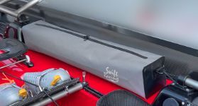 Swift waterproof storage bag installed between rigger mounts on a coastal boat